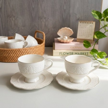 طقم فناجين شاي بورسلان أبيض بزخارف بارزة